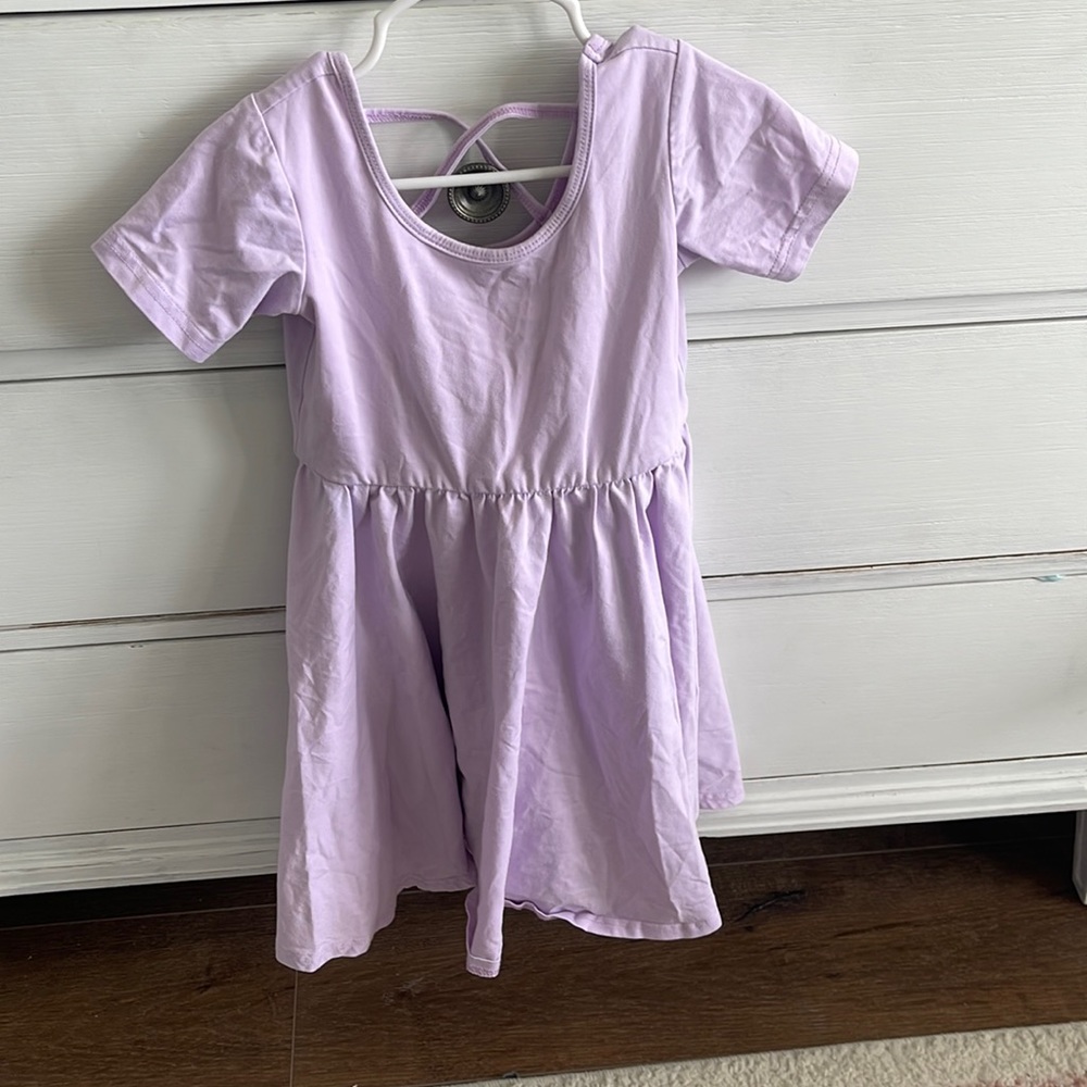 Purple twirling ballet style dress
